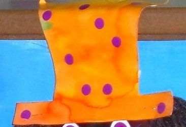 51_ECOLE-CLASSE_Clowns et princesses CD chapeau haut de forme orange
