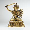 Statuette de <b>Manjusri</b> en bronze doré, Dynastie Qing, XVIIIe siècle