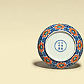 A doucai '<b>lotus</b>' <b>dish</b>, Yongzheng six-character mark in underglaze blue within a double circle and of the period (1723-1735)