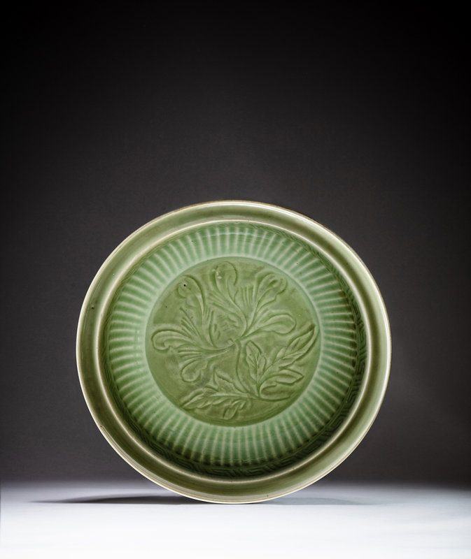 A flutted 'Longquan' celadon-glazed 'flower' charger, Yuan dynasty