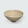 An olive green glazed bowl with carved and combed decoration, Trần dynasty, <b>13th</b>-<b>14th</b> <b>century</b>