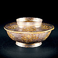 A <b>parcel</b>-<b>gilt</b> <b>silver</b> bowl with cover, Liao dynasty, dated 1025