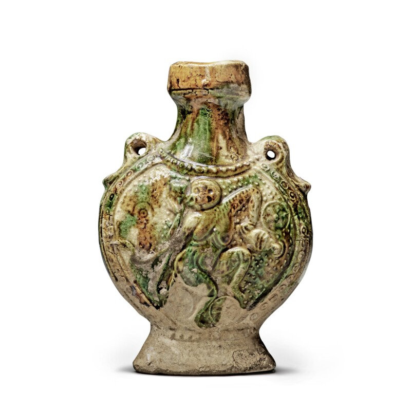 A molded sancai-glazed pottery pilgrim flask, Tang dynasty