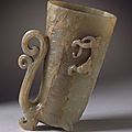 Cup (<b>Guang</b>) in the Form of a Rhyton with Mask, Dragon, and Scrollwork, China, Middle or late Ming dynasty, about 1450-1644