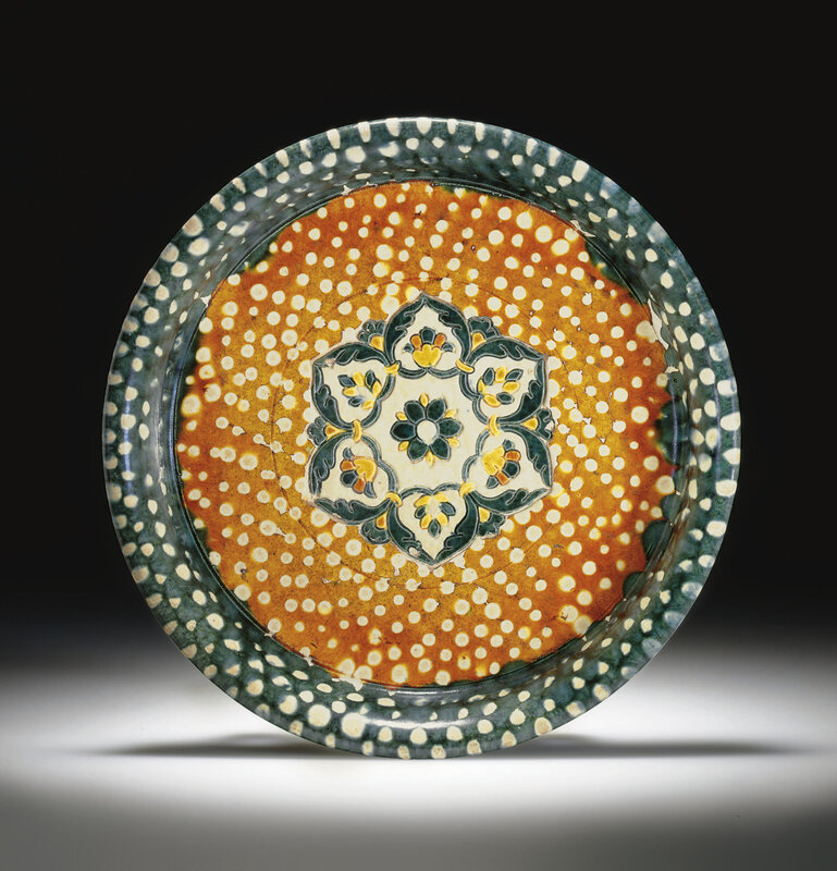 A rare blue, amber and cream-glazed pottery tripod dish, Tang dynasty (618-907