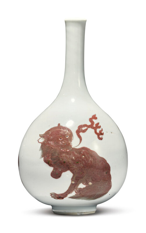 A copper-red-decorated 'Mythical beasts' bottle vase, Qing dynasty, Kangxi period (1662-1722)