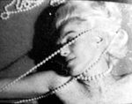 1962_07_12_by_bert_stern_pearls_0044_1