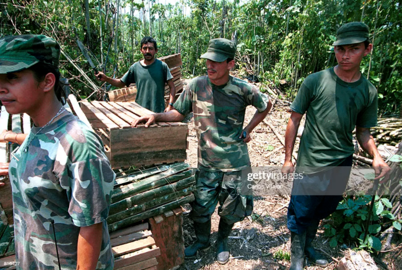 2022-11-28 23_47_53-Revolutionary Armed Forces of Colombia guerrillas make boxes to