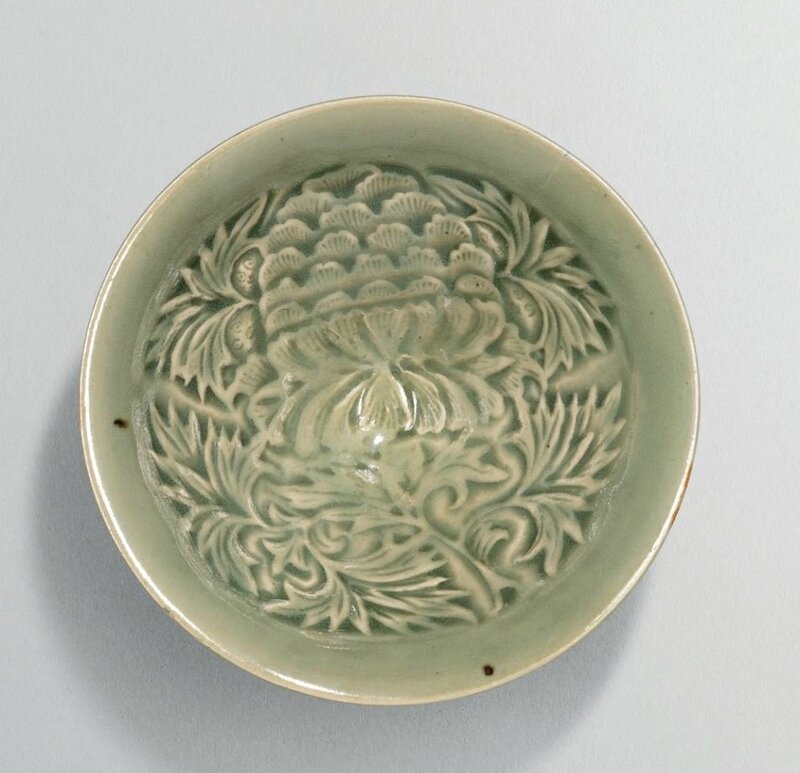 A Yaozhou moulded 'Peony' conical bowl, Northern Song dynasty (960-1127)