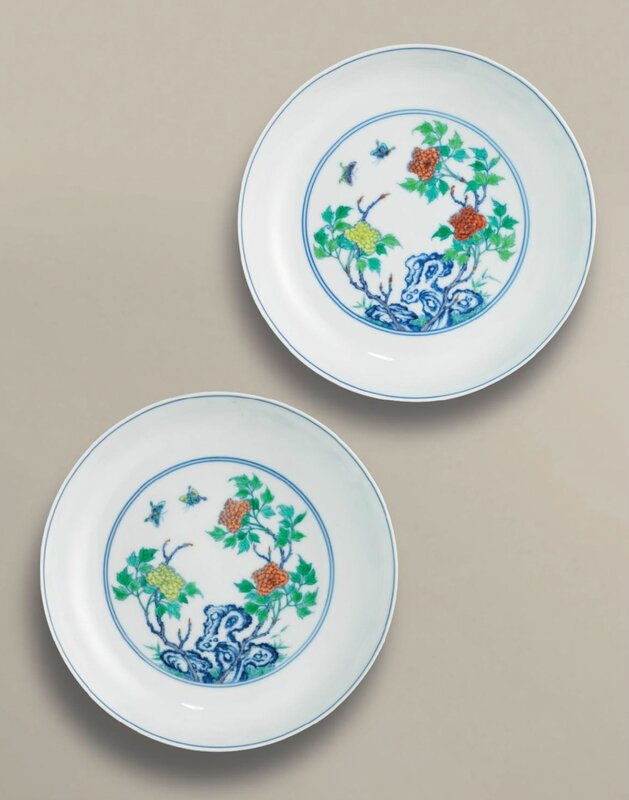 A fine and superbly painted pair of doucai ‘peony’ dishes, Yongzheng six-character marks in underglaze blue within double circles and of the period (1723-1735)