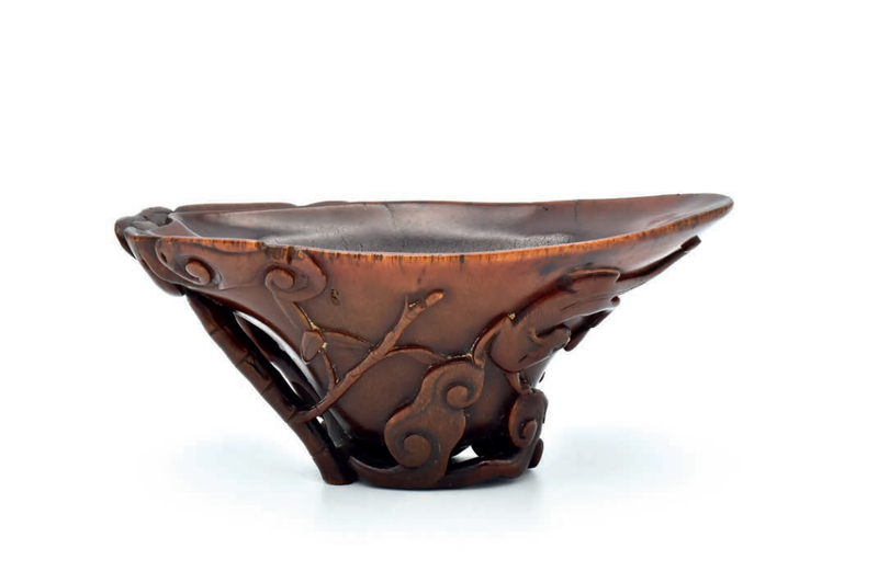 A rare Chinese rhinoceros horn ‘chilong and lingzhi’ libation, cup, Qing dynasty, Kangxi period (1662–1722)