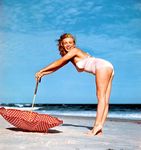 1949_tobey_beach_by_dedienes_umbrella_red_061_1