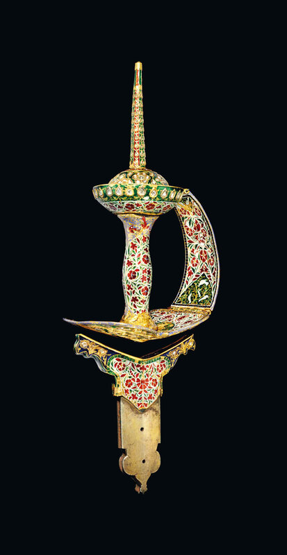 An elegant gemset and enamelled gold sword (khanda) hilt, Mughal India, 18th century