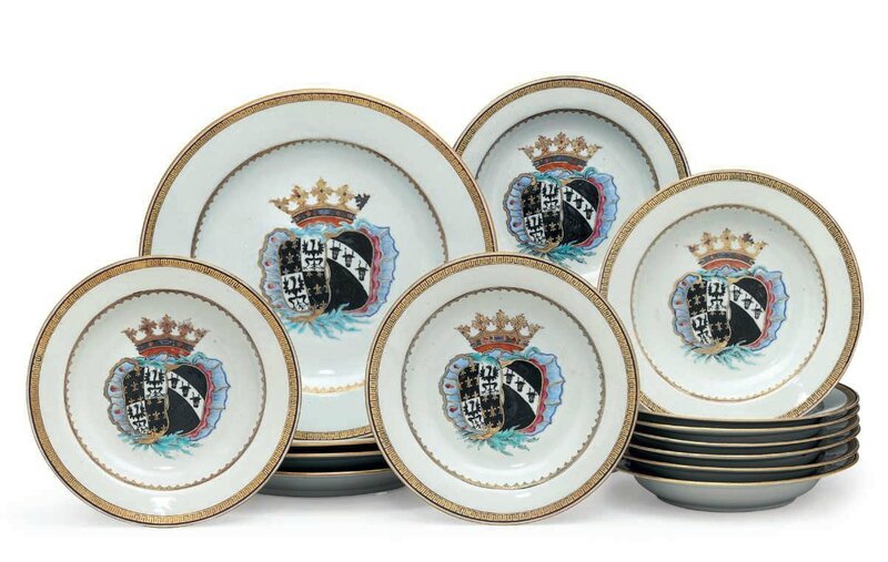 A set of ten armorial soup plates and four chargers for the Dutch market, circa 1752