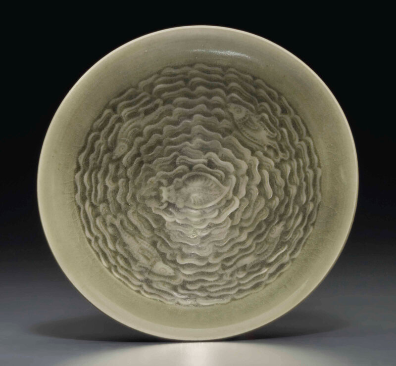A small Yaozhou celadon molded conical bowl, Northern Song-Jin dynasty, 12th-13th century