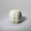 A rare carved Qingbai lobed 'floral' <b>box</b> and cover, Song Dynasty