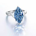 A superb 4.29 carats type IIb <b>marquise</b>-<b>cut</b> <b>fancy</b> <b>vivid</b> <b>blue</b> <b>diamond</b> <b>and</b> <b>diamond</b> <b>ring</b>, by Moussaieff