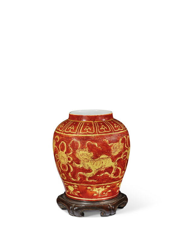 A rare small red and yellow-enamelled 'Buddhist lion' jar, Jiajing six-character mark and of the period (1522-1566)