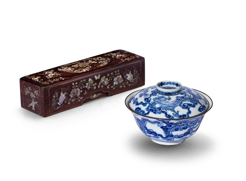 A 'bleu de Hué' porcelain bowl and cover and a mother-of-pearl inlaid huali box and cover, Vietnam, 19th century