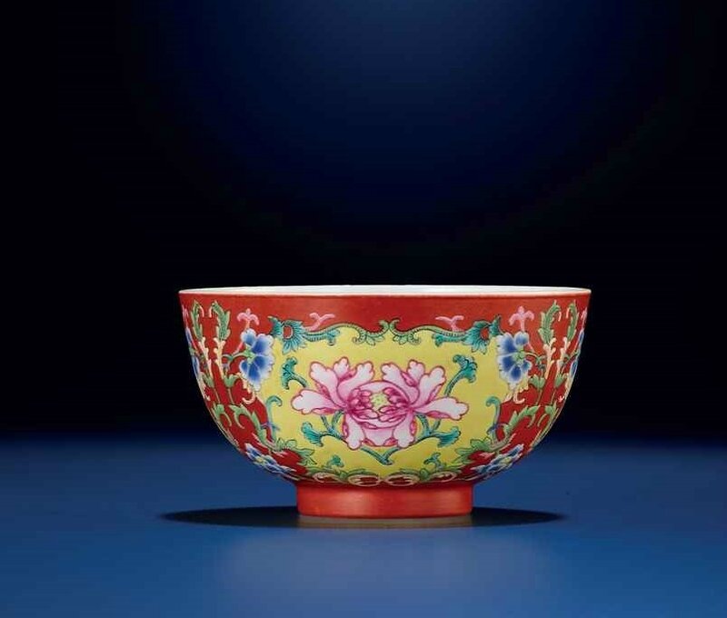 A fine and very rare coral-ground famille rose bowl, Qianlong six-character seal mark and of the period (1736-1795)