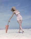 1949_tobey_beach_by_dedienes_umbrella_red_051_1