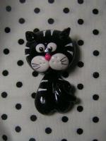 broche chat