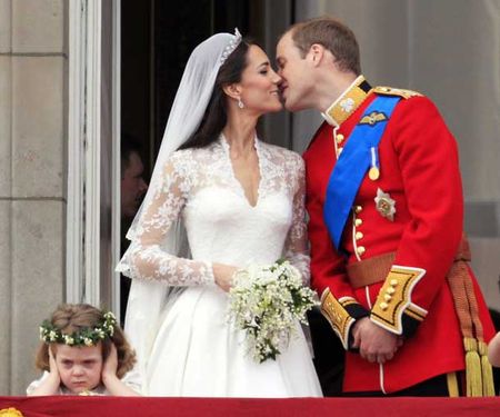 britain_s_prince_william_kisses_his_wife_kate_duchess_of_cambridge_on_the_balcony_of_buckingham_palace_pic_ap_702483650