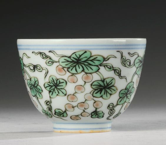 A rare and unusual blue and white and enameled cup, Jiajing mark and period (1522-1566)