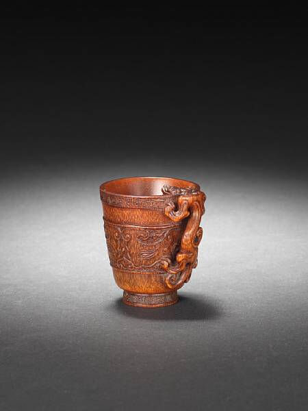 A rare archaistic rhinoceros horn libation cup. 17th-18th century; 6cm (2¼in) high. Sold for £ 85,200 (€ 96,620) at Bonhams London, 11 November 2010, lot 471