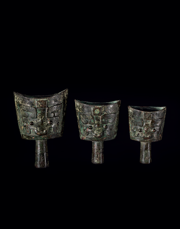 A rare set of three small bronze bells, nao, late Shang dynasty, 13th-11th century BC