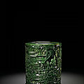 A reticulated <b>spinach</b> <b>jade</b> brushpot, Qing dynasty, 18th century