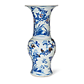 A <b>copper</b>-red and underglaze-blue-decorated 'phoenix tail' vase, Kangxi period (1662-1722)