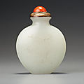A white nephrite 'plum blossom' snuff bottle. Probably Imperial, attributable to the palace workshops, <b>Beijing</b>, 1740–1799