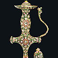 A gemset and enamelled sword (tulwar) hilt, Benares, Late <b>18th</b>-<b>early</b> <b>19th</b> <b>century</b>