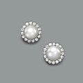 A pair of fine natural pearl and <b>diamond</b> <b>earclips</b> 