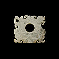 A jade 'animal mask' pendant, <b>Han</b> dynasty (206 BC-220 AD)