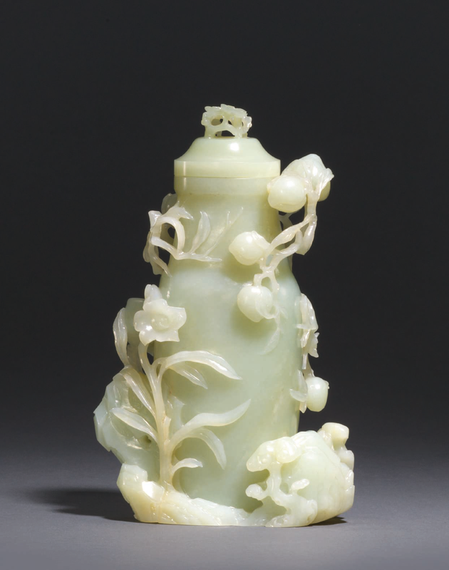 A pale greenish-white jade 'Nine peach' vase and cover, 18th century