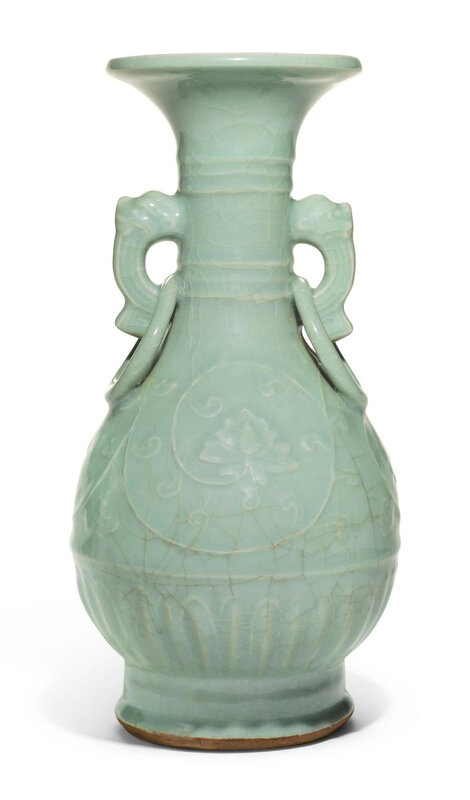 A rare moulded 'Longquan' celadon ring-handled vase, Yuan dynasty (1279-1368)