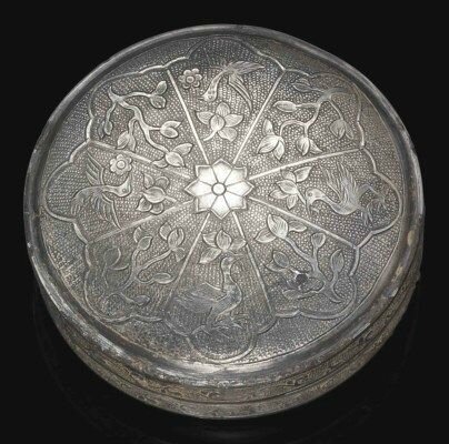 A fine small circular silver box and cover, Tang dynasty (618-907)