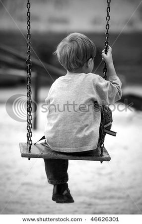 stock_photo_lonely_boy_in_the_park_black_and_white_photo_46626301