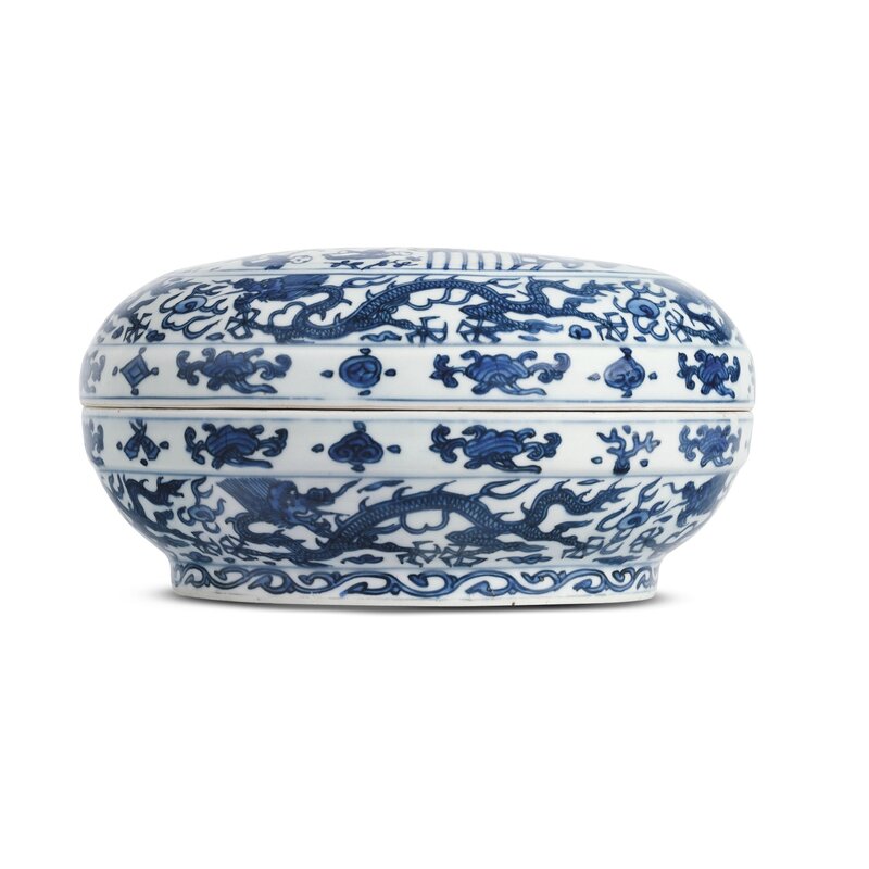 A well-painted blue and white box and cover with children at