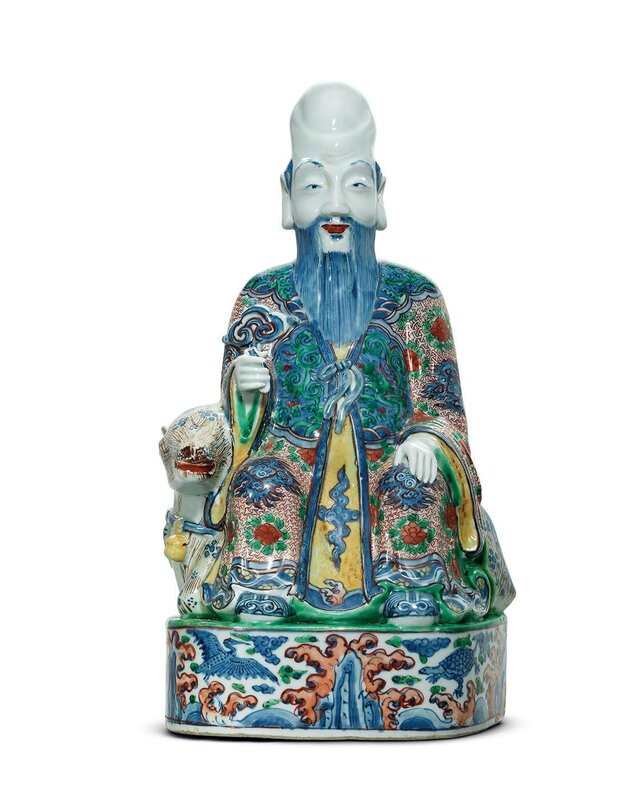 A large and rare Ming wucai seated figure of Shoulao, Wanli period (1573-162)