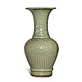 A carved ‘<b>Longquan</b>’ <b>celadon</b>-<b>glazed</b> 'floral' vase, Ming dynasty