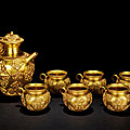 A set of six gold cups and a ewer, late Tang dynasty or Five Dynasties, 7th-<b>10th</b> <b>century</b>