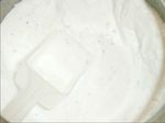 Plastic_spoon_n_Laundry_detergent_n_Washing_powder_in_white