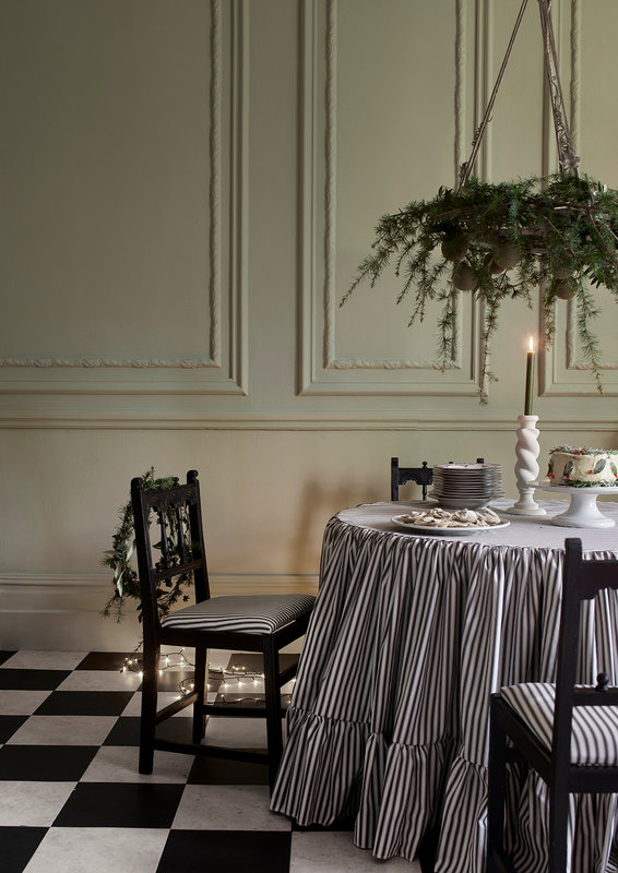 Annie-Sloan-Christmas-Dining-room-Sage-Wall-Paint-Athenian-Black-chair-Ticking-in-Graphite-tablecloth-seat-cushions-Lifestyle-Portrait3