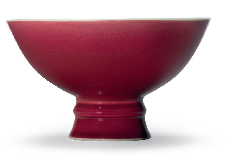 A copper-red-glazed stem bowl, Qianlong six-character seal mark in underglaze blue in a line and of the period (1736-1795)