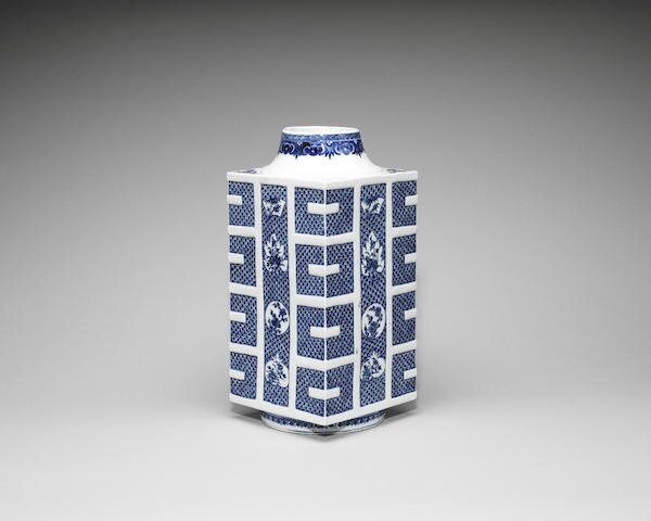 A blue and white soft-paste square vase, cong, 18th century